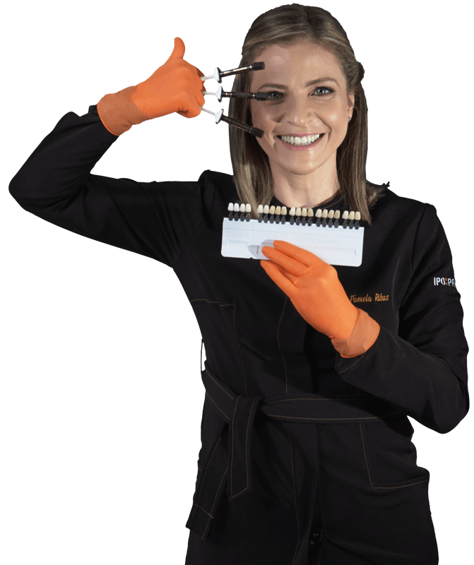 dra-Pamela-segurando-dentes-de-porcelana